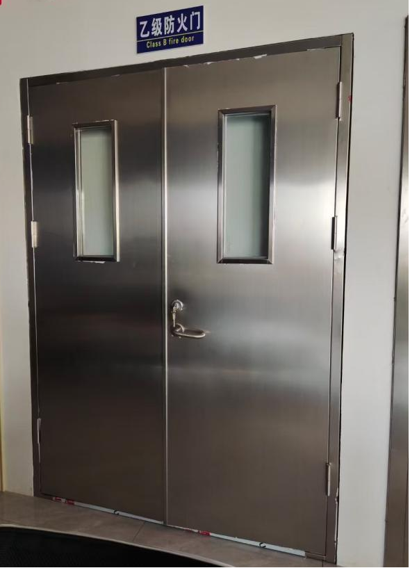 Stainless steel fire door double open with a window